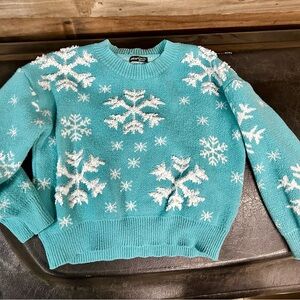 Women's Blue Snowflake Sweater fits medium